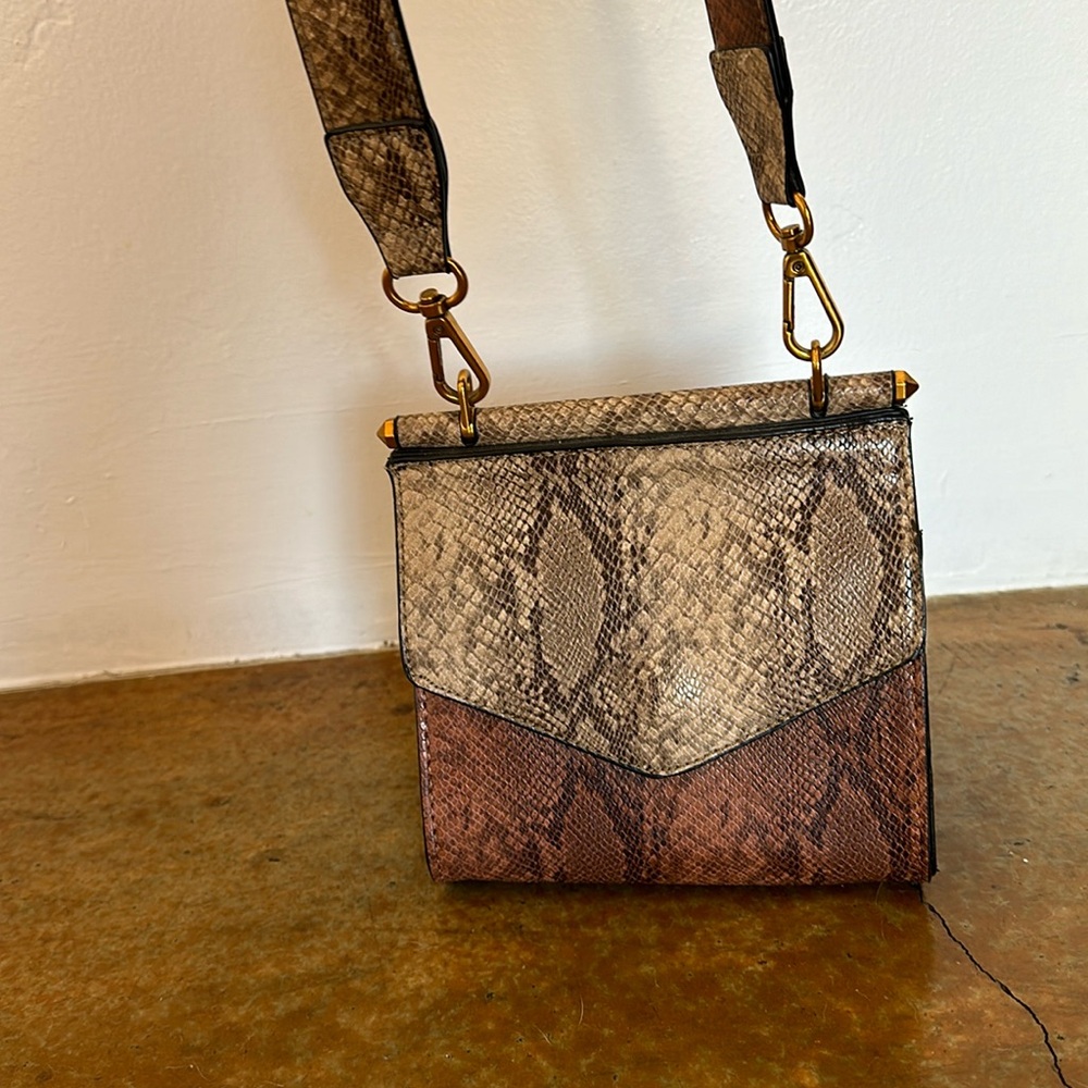 Faux snake skin bag from anthropologie, new no tags. Street level brand.
